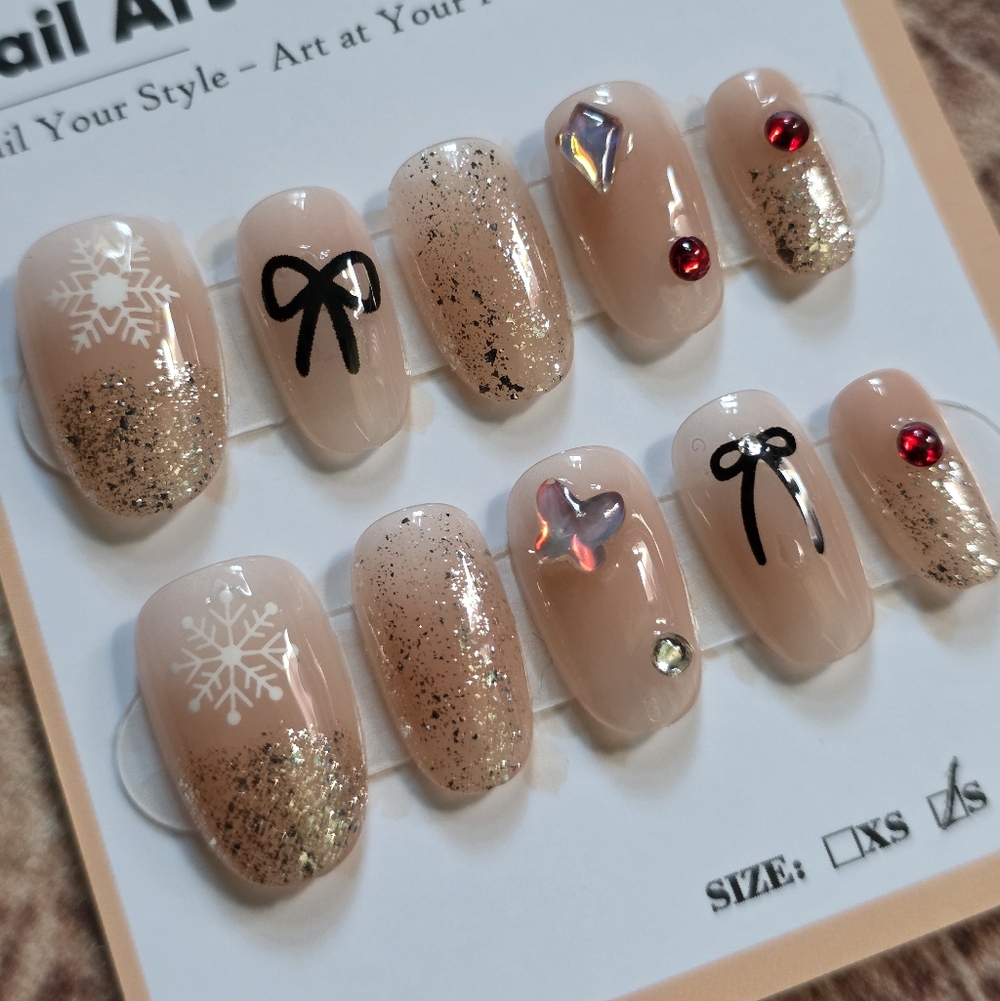 67. Nude & Gold Glitter Holiday Press-On Nails with Red Gems